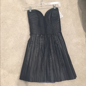 Strapless faux leather mini dress